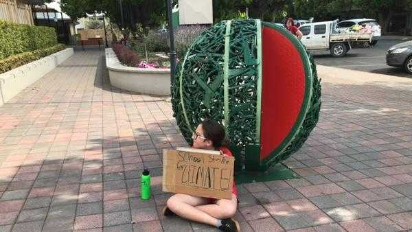Ariel Ehlers staged her own strike outside Chinchilla State School, Chinchilla, Brisbane. CREDIT TONY MOORE Ariel Ehlers staged her own strike outside Chinchilla State School, Chinchilla, Brisbane. CREDIT TONY MOORE