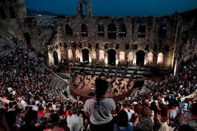 The Greek National Opera performing at the Herodus Atticus ancient theatre at the foot of the Acropolis last month(AFPGetty) The Greek National Opera performing at the Herodus Atticus ancient theatre at the foot of the Acropolis last month(AFPGetty)